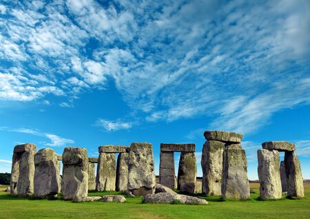 Stonehenge at ancient prehistoric stone monument of Neolithic and Bronze, built as a ring near Salisbury with dramatic sky, Wiltshire in England, United Kingdomの写真素材