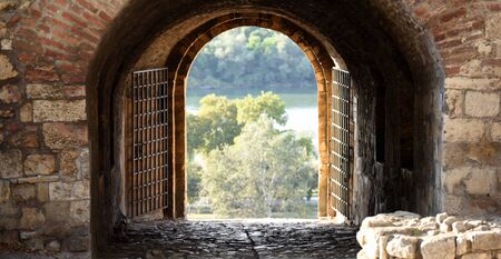View through one of the gates, made in brick and stone wall, on Kalemegdan fortress, Belgrade, Serbiaの写真素材