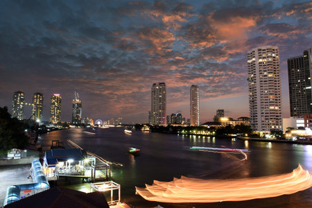 Night view of the Chao Phraya River in Bangkok, Thailand.の写真素材