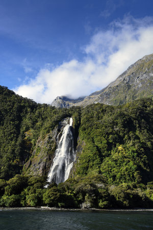 Stirling Falls in the natural wonder Milford Sound, Fiordland National Park, Southland, New Zealandの写真素材