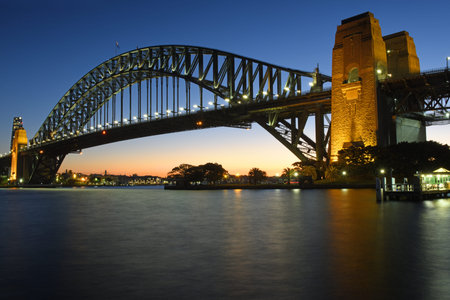 Sydney Harbor Bridge at night, Australia. The Sydney Harbor Bridge is a steel arch bridge in Sydney,...