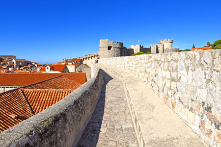 Walk on the ancient, defensive city wall in Dubrovnik, Croatia on the Dalmatian Coast of the Adriatic Seaの写真素材