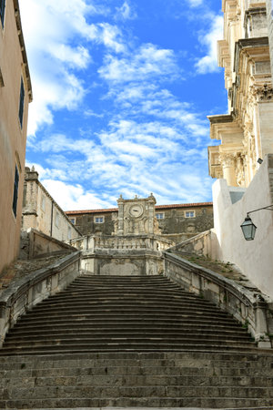 Staircase leading up to the Jesuit Church of St. Ignatius Loyola and the old Collegium Ragusinum in Dubrovnik, Croatiaの写真素材