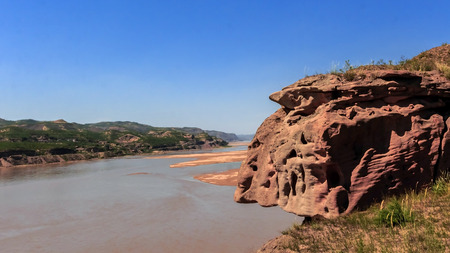 Landscape scenery view of a yellow riverの写真素材