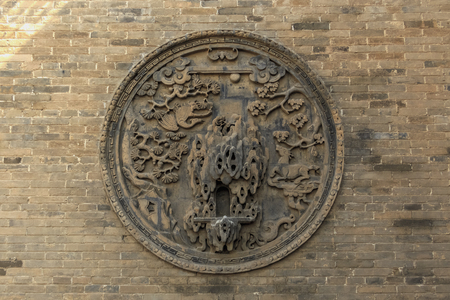 China's Shanxi Yuci Changjia Manor Brick Carving Wallのeditorial素材