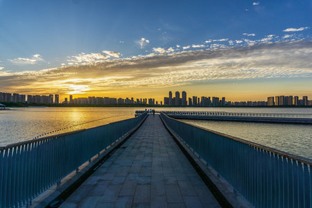 Scenery of Hangzhou Lujiazui Lake Park at sunsetの写真素材