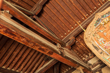 wooden roof of the temple in thailand, closeup of photo