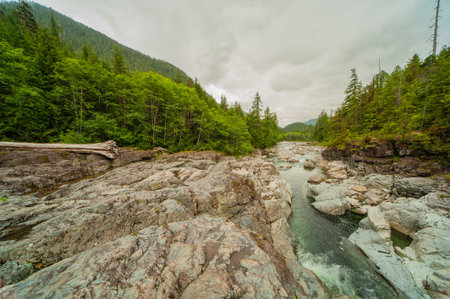 Panoramic view of the rugged riverbed of the Kennedy river on Vancouver Island, which has been...