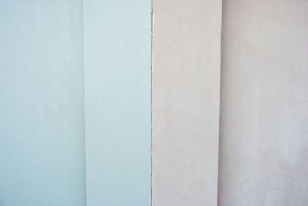 Texture shot of the surface of a wall, split vertically by different colorsの写真素材