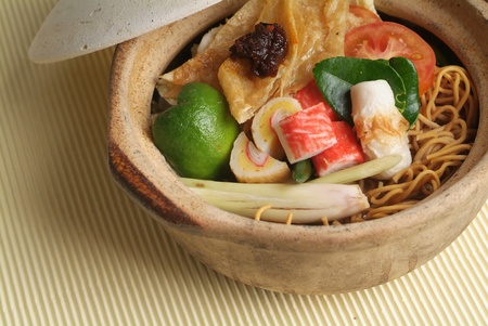 Claypot seafood noodlesの写真素材
