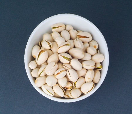 pistachio nuts on Black backgroundの写真素材