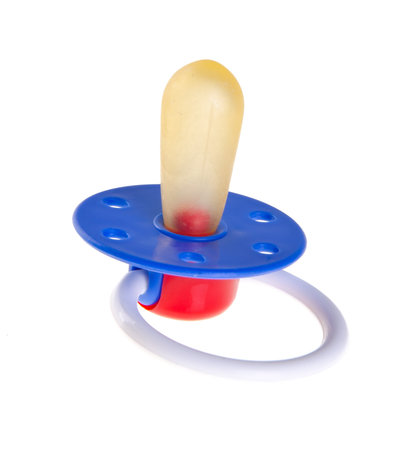 baby dummy silicone on a background