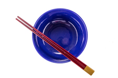 Japanese chopsticks on a bowlの写真素材