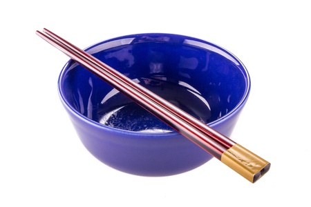 Japanese chopsticks on a bowlの写真素材