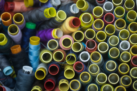 spools. many colorful spools of thread for sewing, colorful backgroundの写真素材