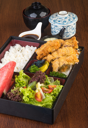 japanese cuisine. lunch box set on a backgroundの写真素材