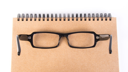 eye glasses. eye glasses with book on backgroundの写真素材