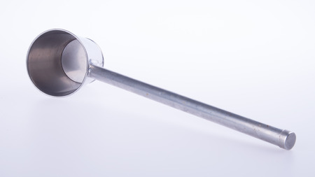 ladle or metallic ladle on a backgroundの写真素材