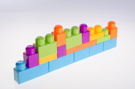 Plastic building blocks on a white background