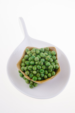 nuts or crispy coated green pea on the white backgroundの写真素材