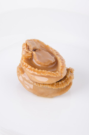 Chinese cuisine abalone on the white background.の写真素材