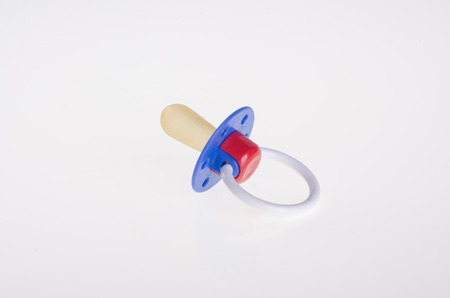 baby dummy silicone on a white backgroundの写真素材