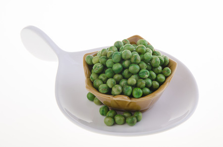 nuts or crispy coated green pea on the white backgroundの写真素材
