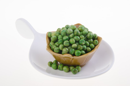 nuts or crispy coated green pea on the white backgroundの写真素材