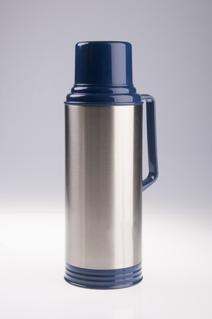 Thermo flask. Thermo flask on the backgroundの写真素材