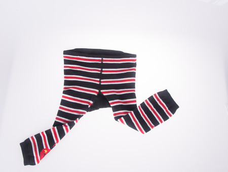 Childrens striped pants isolated on a white background.の写真素材