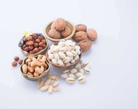 nuts. mixed nuts on backgroundの写真素材