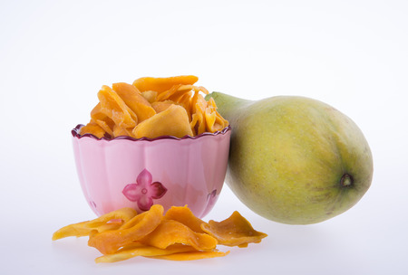 mango dry in bowl or dried mango slicesの写真素材