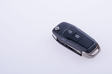 key or car key with remote on background