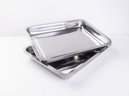 tray or metal baking tray on backgroundの写真素材