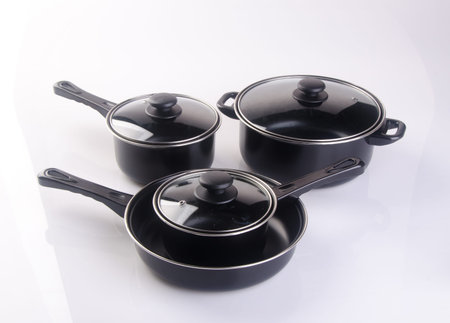 pot or stainless steel pot on a backgroundの写真素材