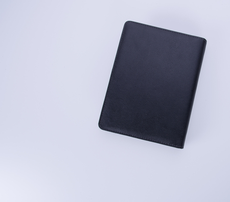 notebook or black leather notebook on the blackgroundの写真素材