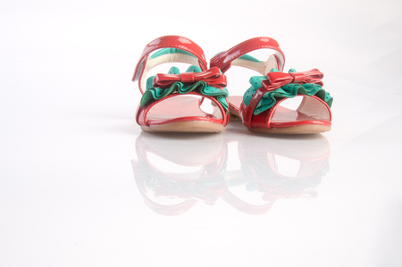 shoe or beautiful little girl shoes on a backgroundの写真素材