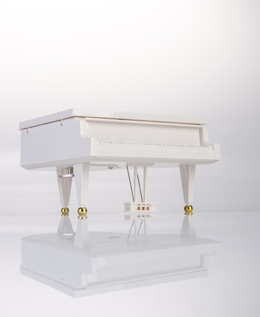 toy or toy grand piano on a backgroundの写真素材