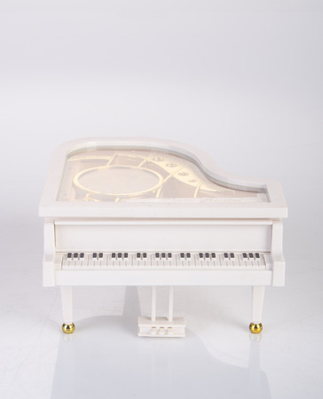 toy music box or piano music box on a backgroundの写真素材