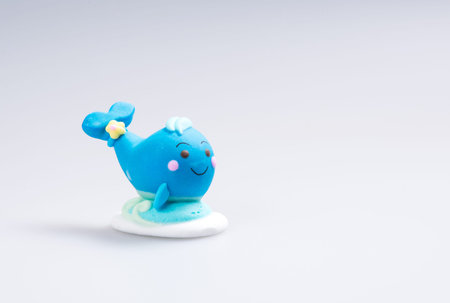 cake decoration or homemade "whale" cake decoration on a backgroundの写真素材