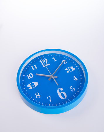 clock or wall clock on a backgroundの写真素材