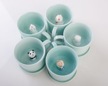 mug or handmade animal ceramic mug on background.mug or handmade animal ceramic mug on background.の写真素材