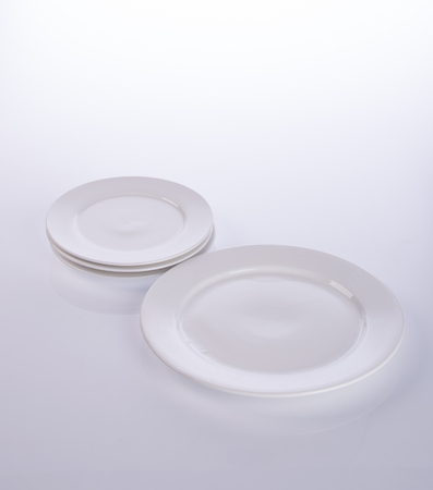 plate or ceramic tableware on the backgroundの写真素材