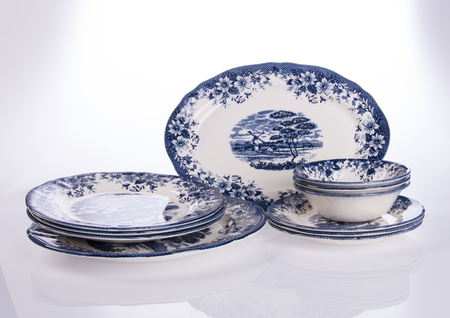 plate or flowers on plate painted by hand on backgroundの写真素材