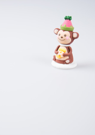 cake decoration or homemade "monkey" cake decoration on a backgroundの写真素材