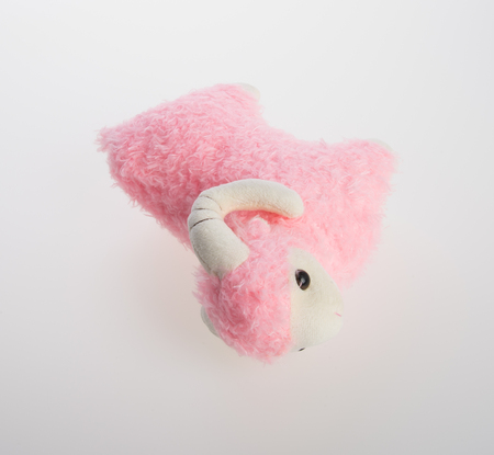 toy or goat or sheep on a backgroundの写真素材