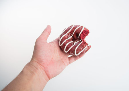 donut or donut with missing bite on a background
