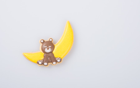 Homemade "bear" cake decoration on a grey backgroundの写真素材