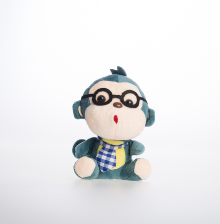 toy or monkey soft toy on the backgroundの写真素材