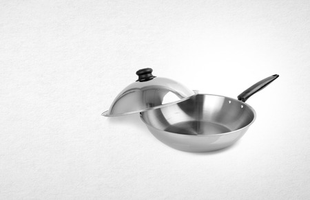 pan or stainless steel pan on backgroundの写真素材